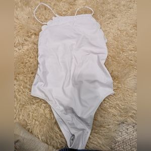 White scalloped one piece bathing suit, size L, never worn